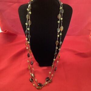 Very long Glass beads on a lace necklace